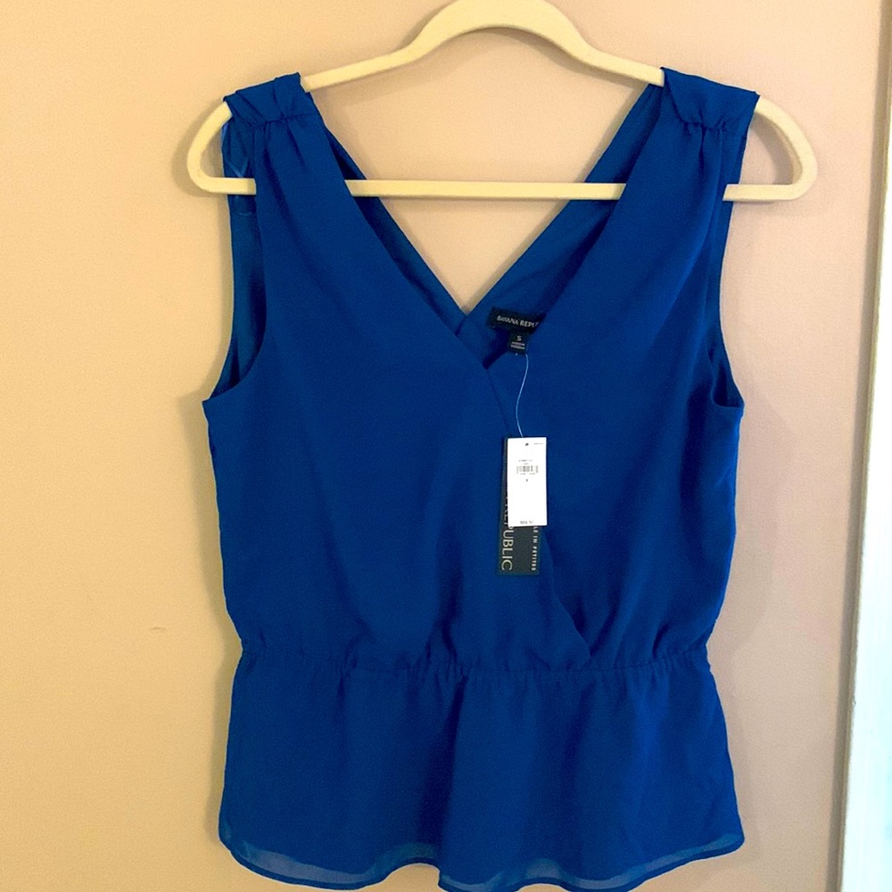 Sleeveless Peplum Blouse